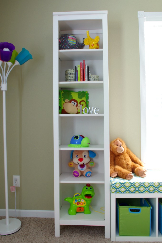 We made the bench seat in our playroom more functional. It is organized in a way that makes the most of the space we have! | #organization #organizing #storage #storagebins #organized #kallax #playroom